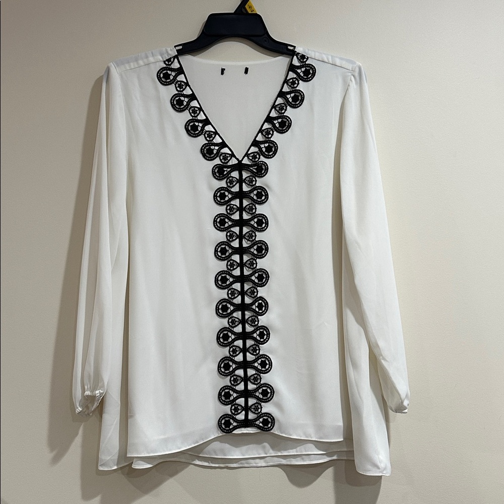 Chic White Blouse with Black Detailing